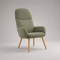 Poltrona imbottita a 1 posto in tessuto verde salvia con schienale alto, braccioli e gambe in legno, 75 x 82 x 101 cm